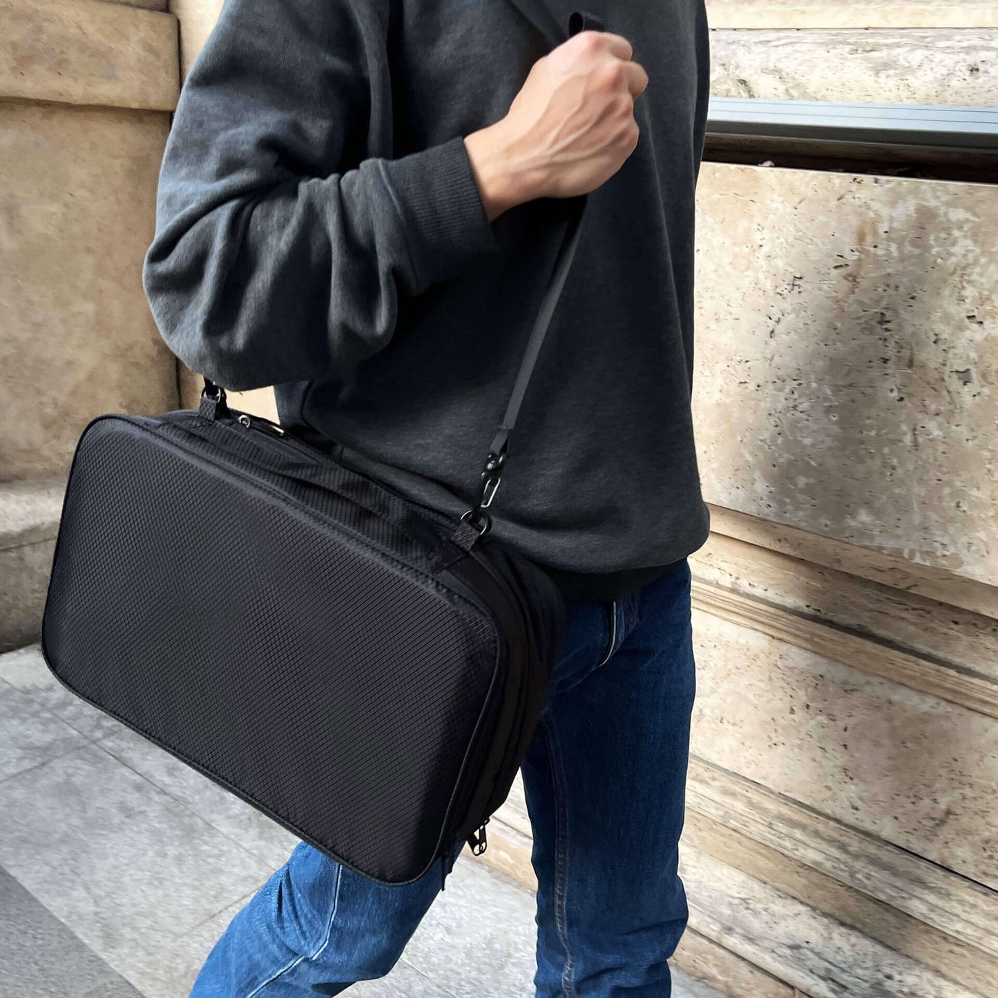 FLEX modular bag carried crossbody during city walking