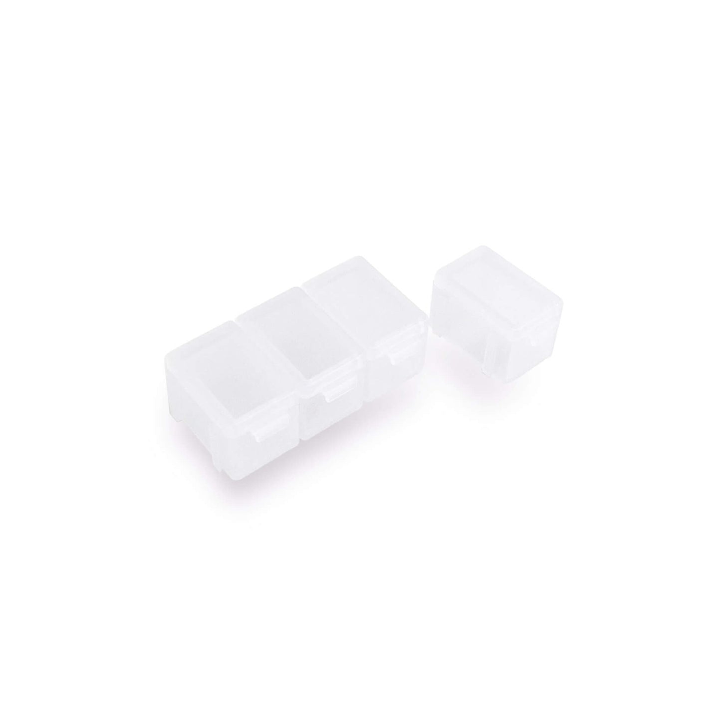 A set of detachable and combinable mini pill cases made of translucent plastic.