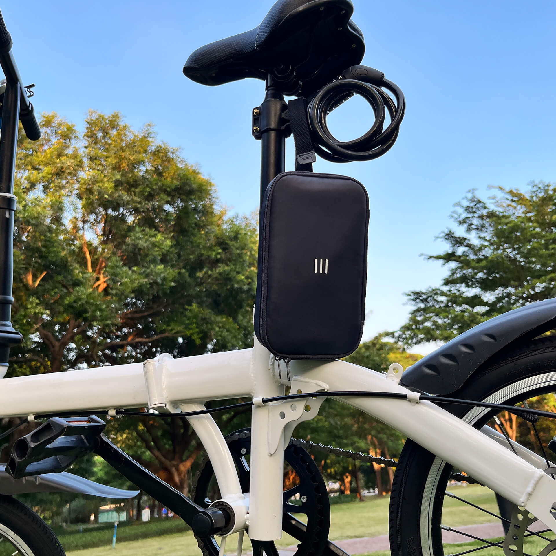 a charcoal 190+ organizer attached to a bike in outdoor activity