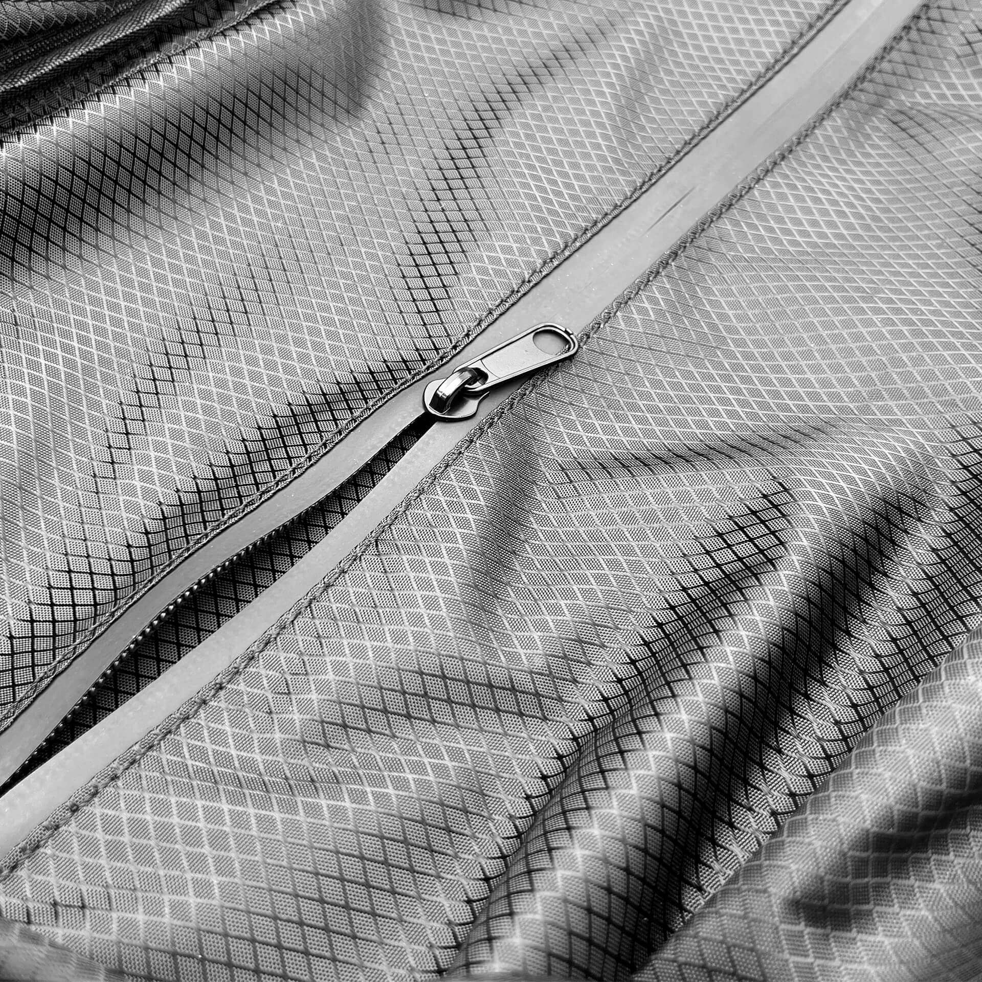 Close-up of the FLEX waterproof zipper and ripstop fabric material