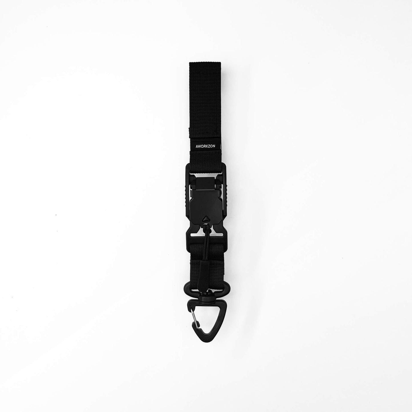 A black quick-release strap with a quick-release magnetic buckle used as a crossbody stabilizer